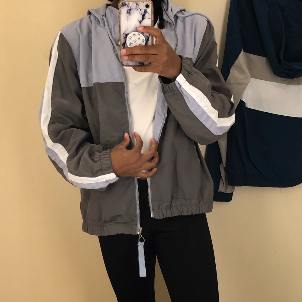 Grey and blue/purple windbreaker